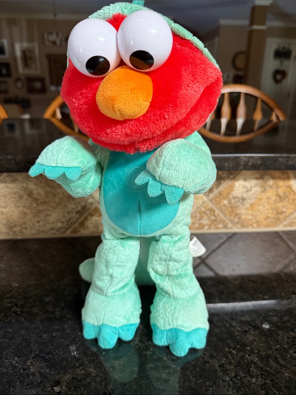 Sesame Street Dino Stomp Elmo
13-Inch Plush Stuffed Animal...